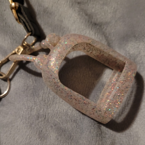 Black crossbody purse with mini glitter sanitizer attachment. - Picture 2 of 4